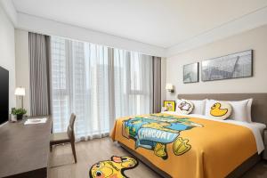 Voodi või voodid majutusasutuse Qingshan Lake Tianlan Hotel Hangzhou toas