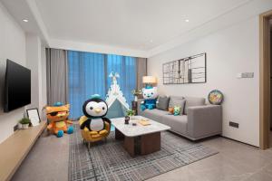 Televiisor ja/või meelelahutuskeskus majutusasutuses Qingshan Lake Tianlan Hotel Hangzhou