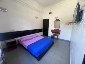 Voodi või voodid majutusasutuse Dung Fang Hotel toas
