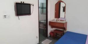 Voodi või voodid majutusasutuse Dung Fang Hotel toas