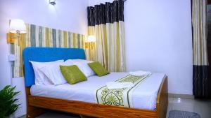 Katil atau katil-katil dalam bilik di Hotel Planet Residency