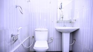 Bilik mandi di Hotel Planet Residency