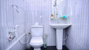 Bilik mandi di Hotel Planet Residency