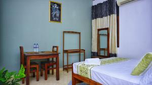 Katil atau katil-katil dalam bilik di Hotel Planet Residency