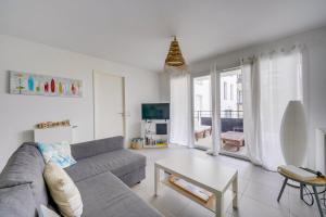 Μια τηλεόραση ή/και κέντρο ψυχαγωγίας στο Appartement Dune-Arcachon centre