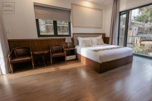 Postel nebo postele na pokoji v ubytování Faru Pine Woods Villa