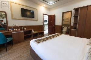 Postel nebo postele na pokoji v ubytování Faru Pine Woods Villa