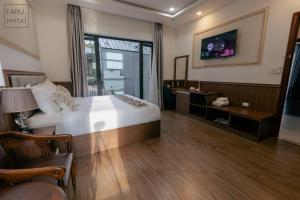 Postel nebo postele na pokoji v ubytování Faru Pine Woods Villa
