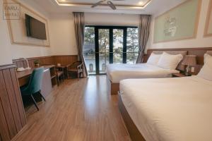 Postel nebo postele na pokoji v ubytování Faru Pine Woods Villa