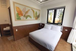 Postel nebo postele na pokoji v ubytování Faru Pine Woods Villa
