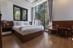 Postel nebo postele na pokoji v ubytování Faru Pine Woods Villa