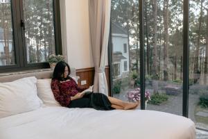 Postel nebo postele na pokoji v ubytování Faru Pine Woods Villa