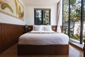 Postel nebo postele na pokoji v ubytování Faru Pine Woods Villa