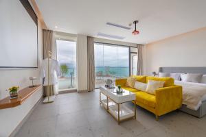 Ένα ή περισσότερα κρεβάτια σε δωμάτιο στο Tianya Jingxi Seaview Inn in Sanya +143 φωτογραφίες