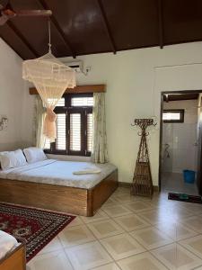 Letto o letti in una camera di Tiger Residency Resort
