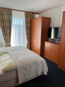 Postel nebo postele na pokoji v ubytování Haus Köbesine