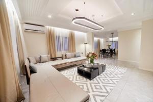 Posezení v ubytování Sleak condo