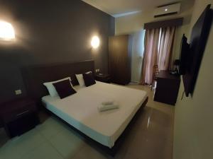 The Windsor Hotel客房内的一张或多张床位