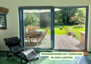 Κήπος έξω από το Haus am Erlenhain mit Sauna und großem, naturnahen Garten