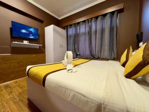 TV o dispositivi per l'intrattenimento presso Hotel Jafson Accommodates