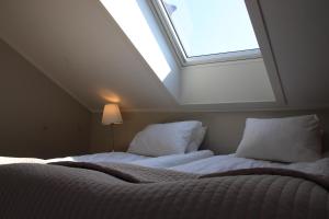 Voodi või voodid majutusasutuse Hotell Villa Solviken toas
