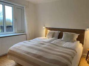 Fotografie z fotogalerie ubytování Lovely House By The Water With Cozy Courtyard v destinaci Thyholm