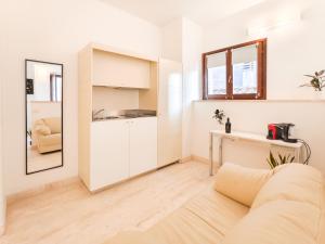 Kuchyň nebo kuchyňský kout v ubytování Oidu - Cagliari Suites