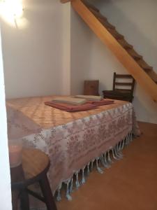 Ένα ή περισσότερα κρεβάτια σε δωμάτιο στο O Quintal - Barrancos