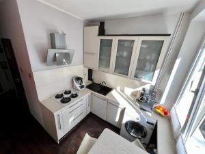 Η κουζίνα ή μικρή κουζίνα στο Gdynia City Stay