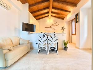 TV a/nebo společenská místnost v ubytování Oidu - Cagliari Suites