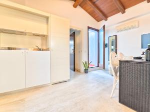Kuchyň nebo kuchyňský kout v ubytování Oidu - Cagliari Suites