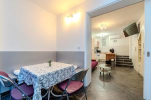 a dining room with a table and some chairs at Boba lovely apartment close to Zrce beach in Gajac