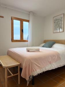 a bedroom with a large bed with a window at Casa Nuevos Vientos CR Los Cuatro Vientos in Moratalla +28 photos