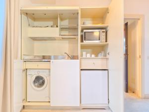 Kuchyň nebo kuchyňský kout v ubytování Oidu - Cagliari Suites