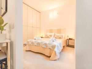 Postel nebo postele na pokoji v ubytování Oidu - Cagliari Suites