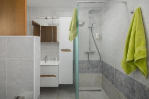 a bathroom with a shower and a sink at Villa Tina Porec in Poreč +54 photos