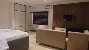Postel nebo postele na pokoji v ubytování Bayview Apartment