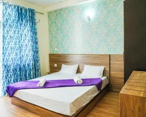 Refined 3BR Independent Apt in Tricity Mohali客房内的一张或多张床位