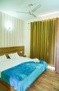 Refined 3BR Independent Apt in Tricity Mohali客房内的一张或多张床位