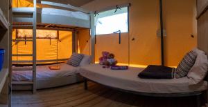 A bed or beds in a room at Casa Mobile - Cisano San Vito ****