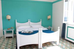 Postel nebo postele na pokoji v ubytování Sunbay Park Hotel