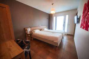 Postel nebo postele na pokoji v ubytování Residence Les Chataigniers