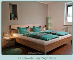 Postel nebo postele na pokoji v ubytování Ferienwohnung Haus Schneider