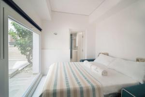 Ένα ή περισσότερα κρεβάτια σε δωμάτιο στο WePuglia - The White Luxury - Apt Nepenthe