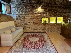 Ruang duduk di Casa vacanze Manuela +1 gambar