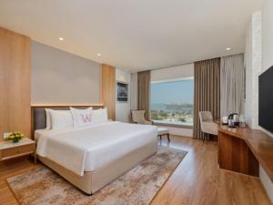 Welcomhotel by ITC Hotels, Ashram Road, Ahmedabad客房内的一张或多张床位