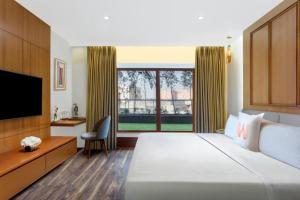 Welcomhotel by ITC Hotels, Ashram Road, Ahmedabad客房内的一张或多张床位