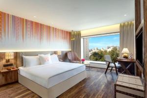 Welcomhotel by ITC Hotels, Ashram Road, Ahmedabad客房内的一张或多张床位