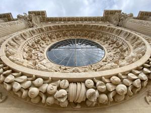 a large stone building with a window in the middle at LECCE MON AMOUR B&B in Lecce