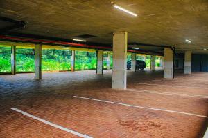 an empty parking lot with a parking lot at Zimbali lakes boulevard edge 214 in Ballito